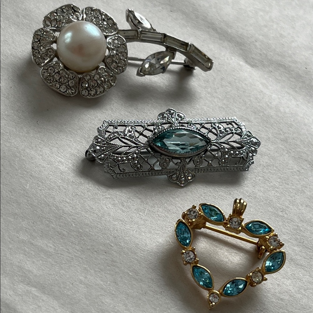 Chic Silver and Gold Brooch Trio with Blue Highlights